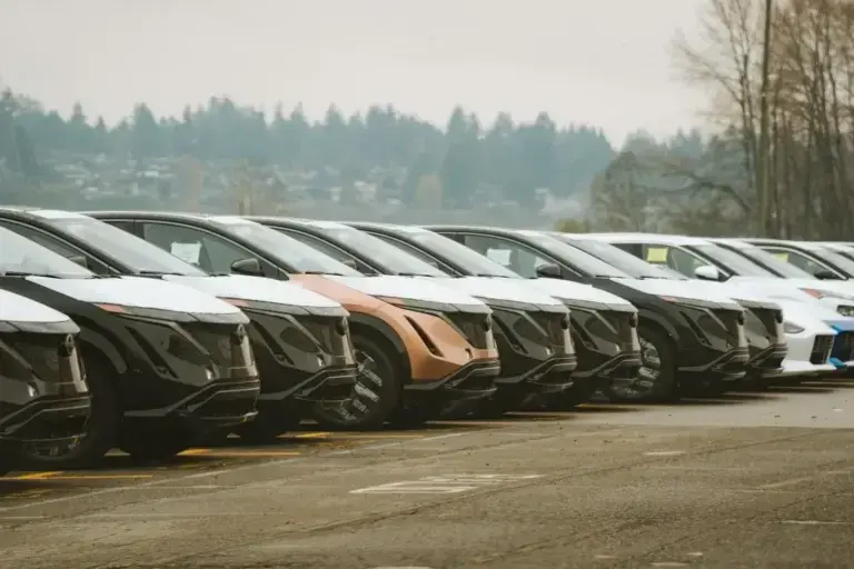 row of parked electric cars in different colors