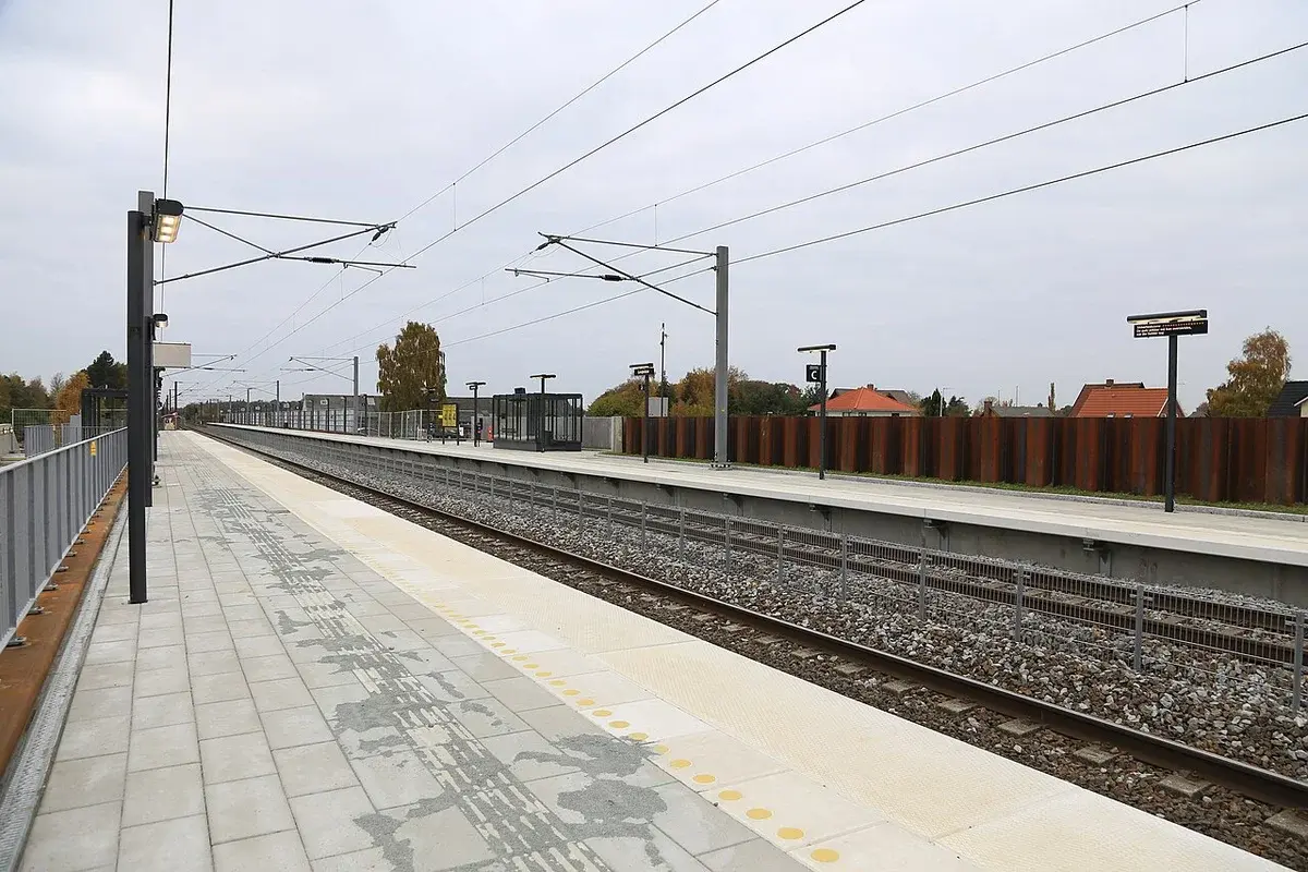 Empty train station platform at Langeskov looking east